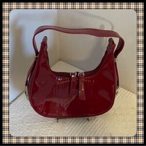 Elegant Burgundy Patent Leather Shoulder Bag
Very Small